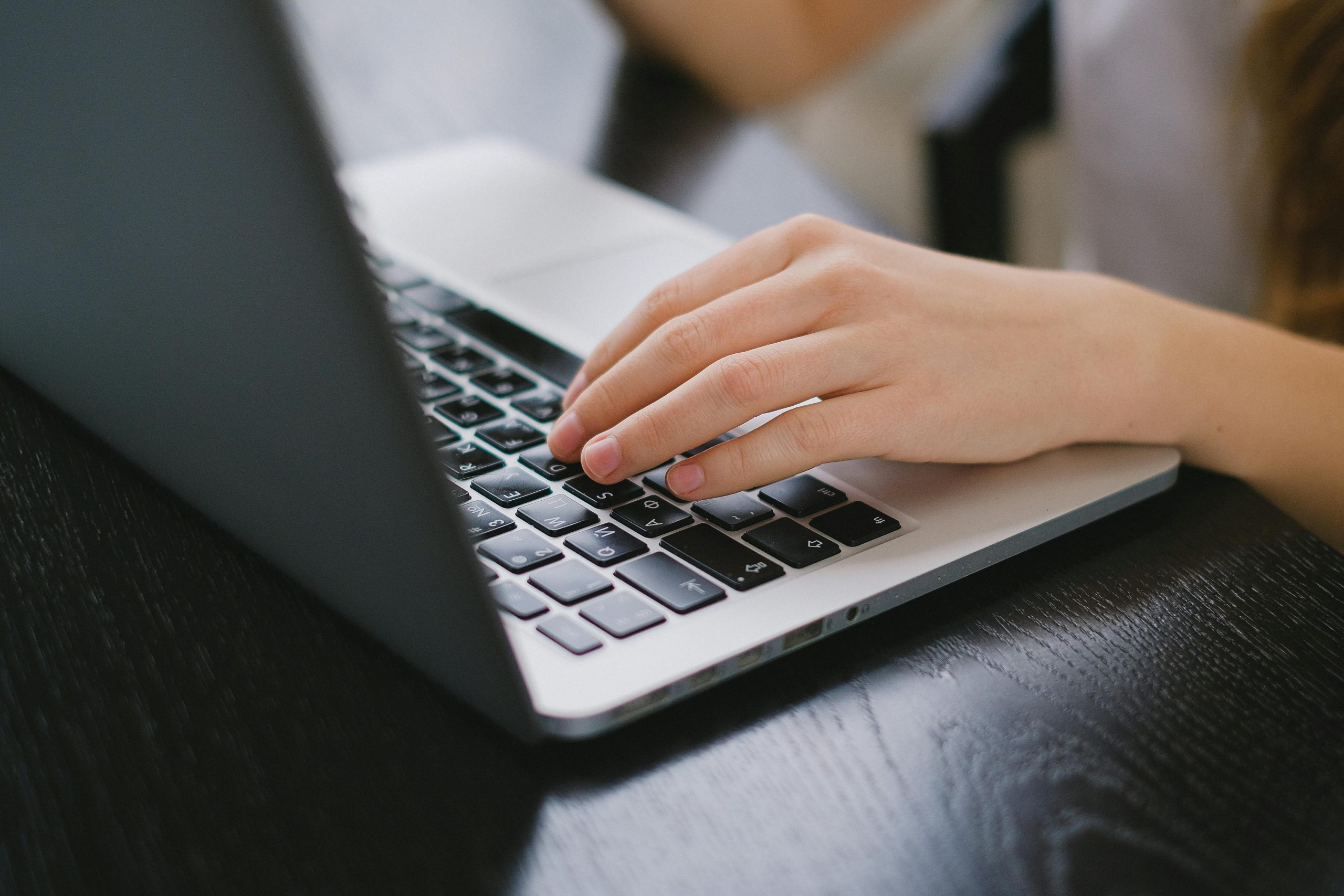 person using laptop