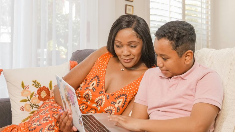 A mother helping her son with homework