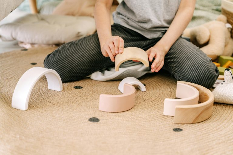 A child playing with wooden blocks