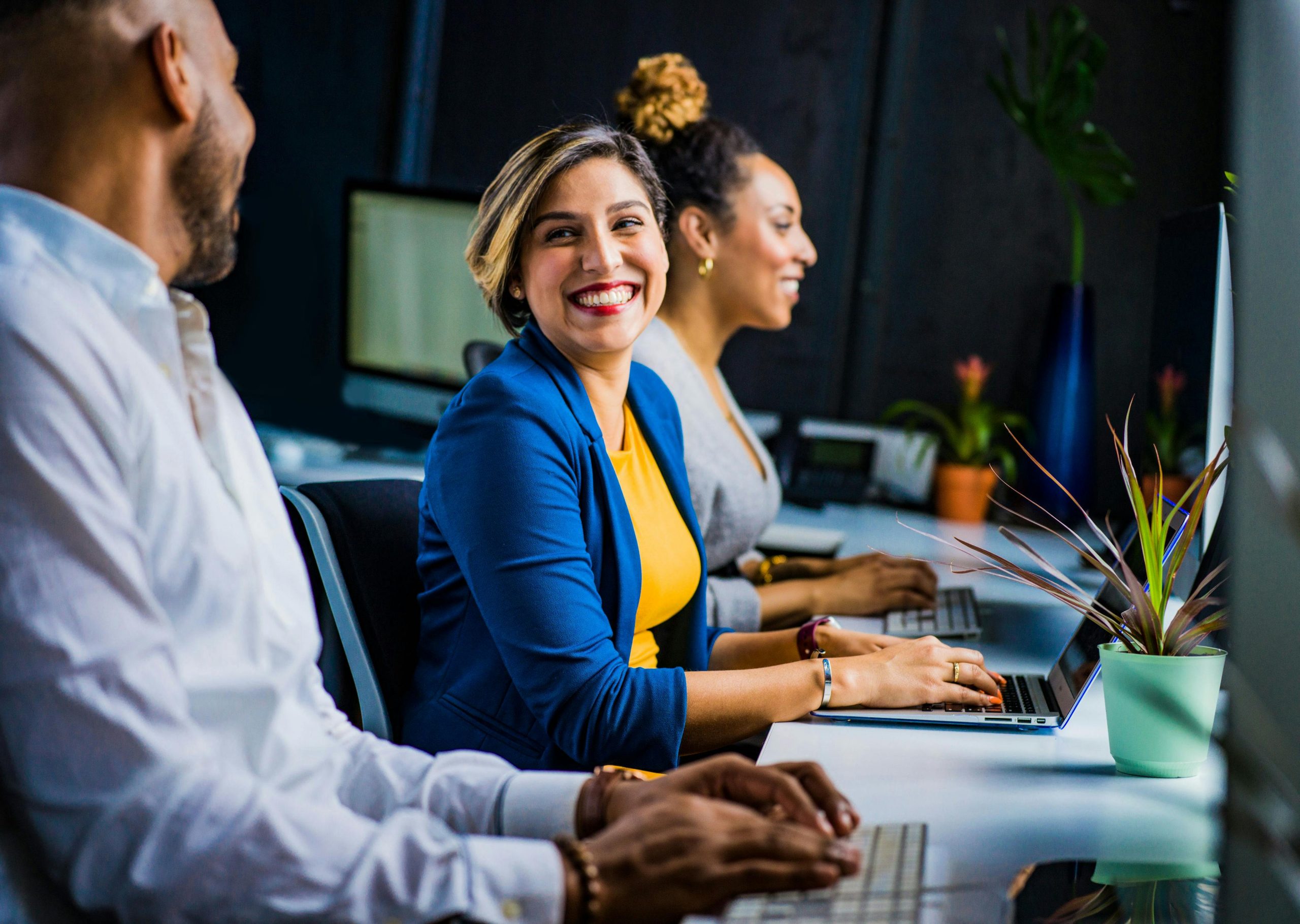 Woman smiling at her colleague