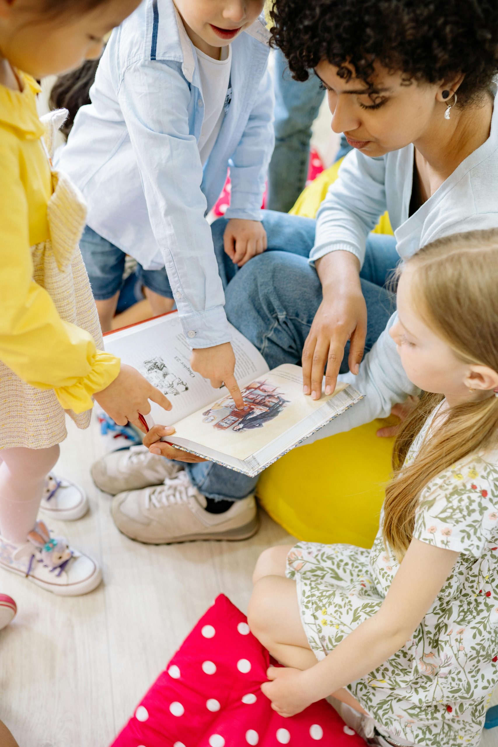 A teacher reading to her students