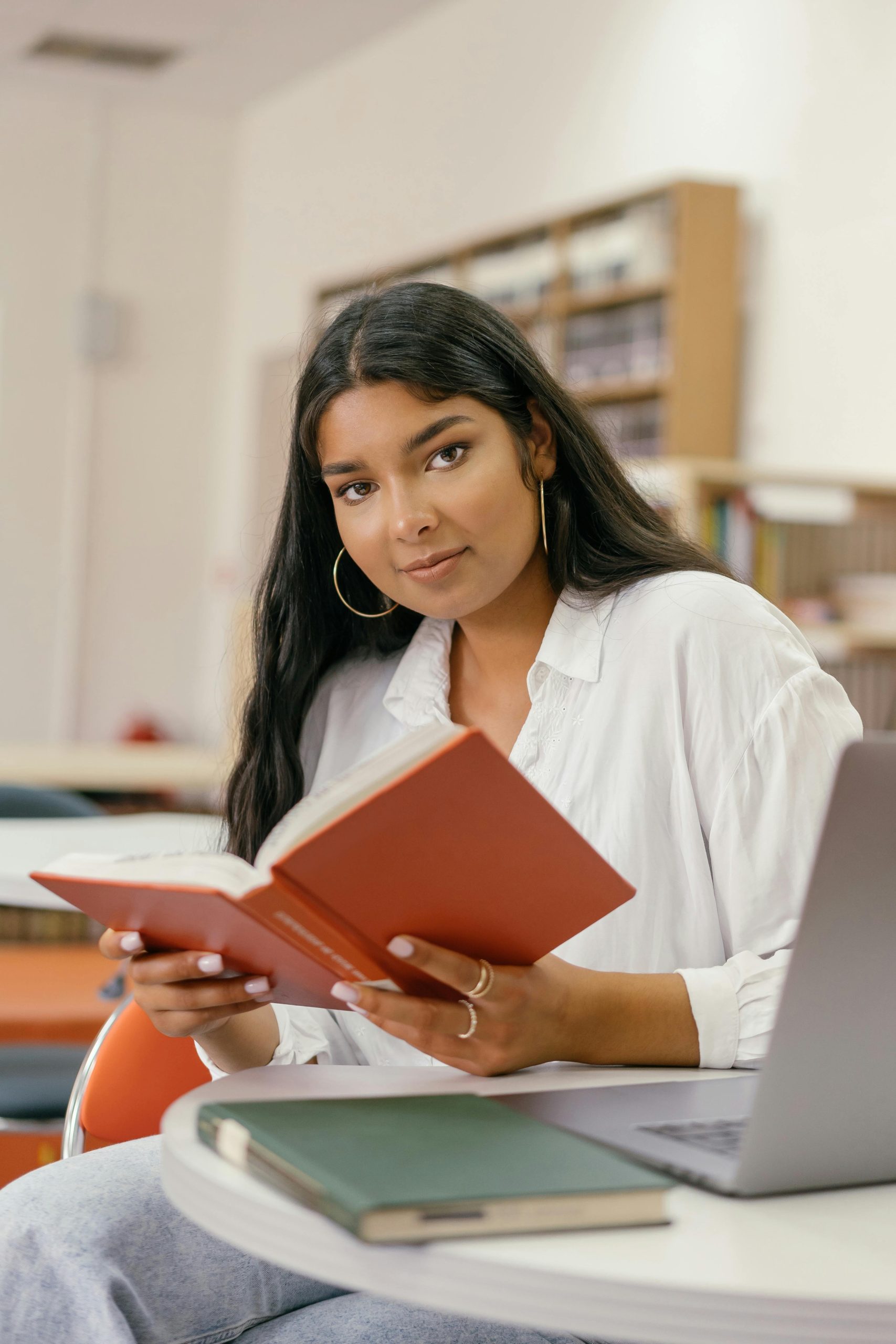A woman holding a book