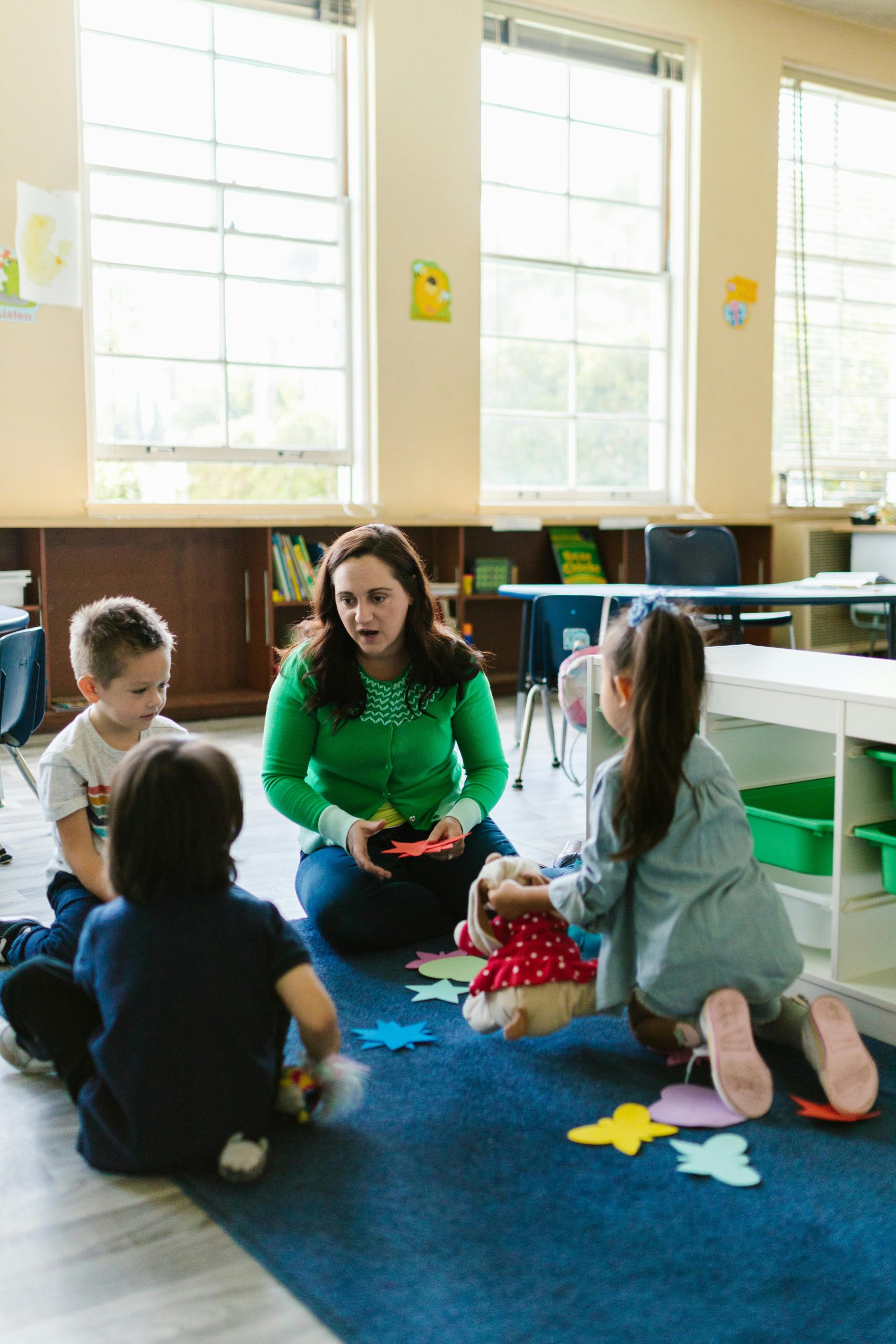 A teacher talking to her students