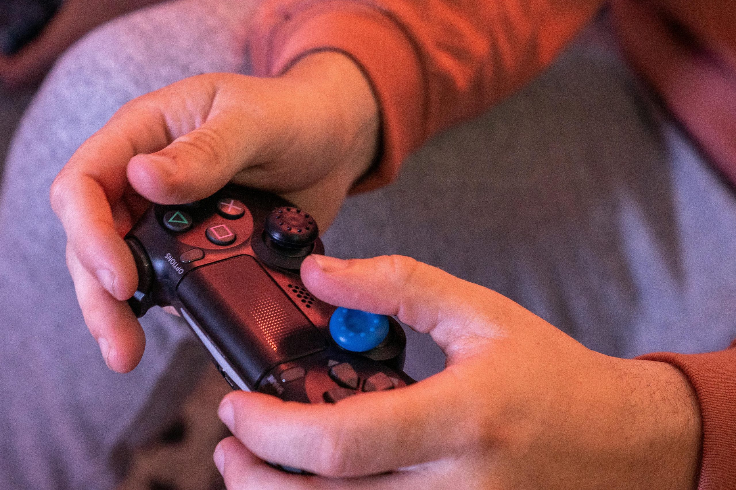 Person holding a game controller