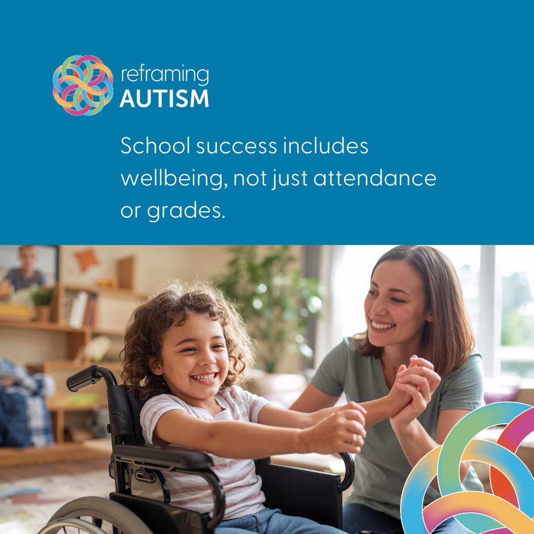 A photo of an teaching assistant holding a girl in a wheelchair's hand and sharing in her joy.